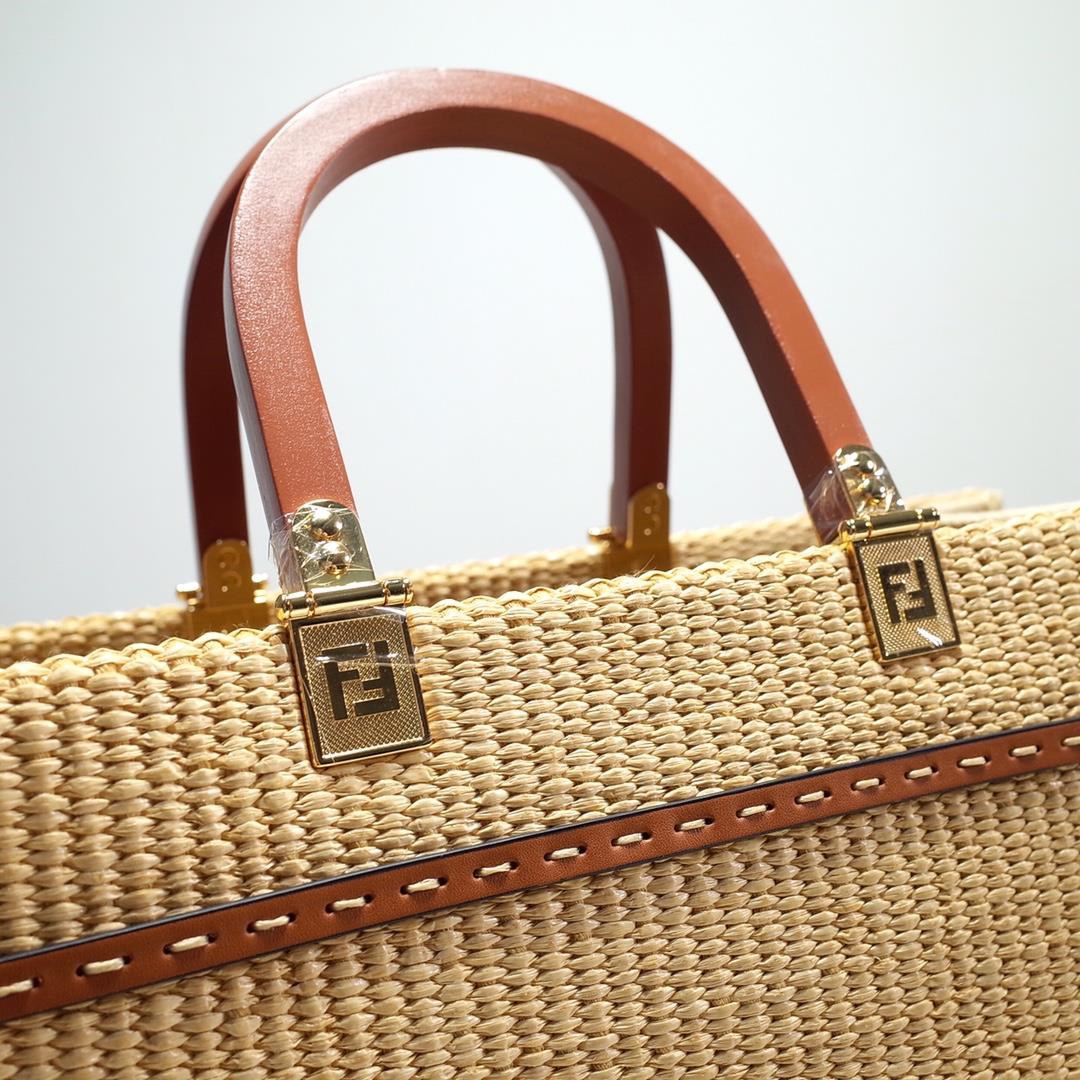 FENDI Sunshine Medium tote bag made of natural grass woven material showcasing a mossy stitchi