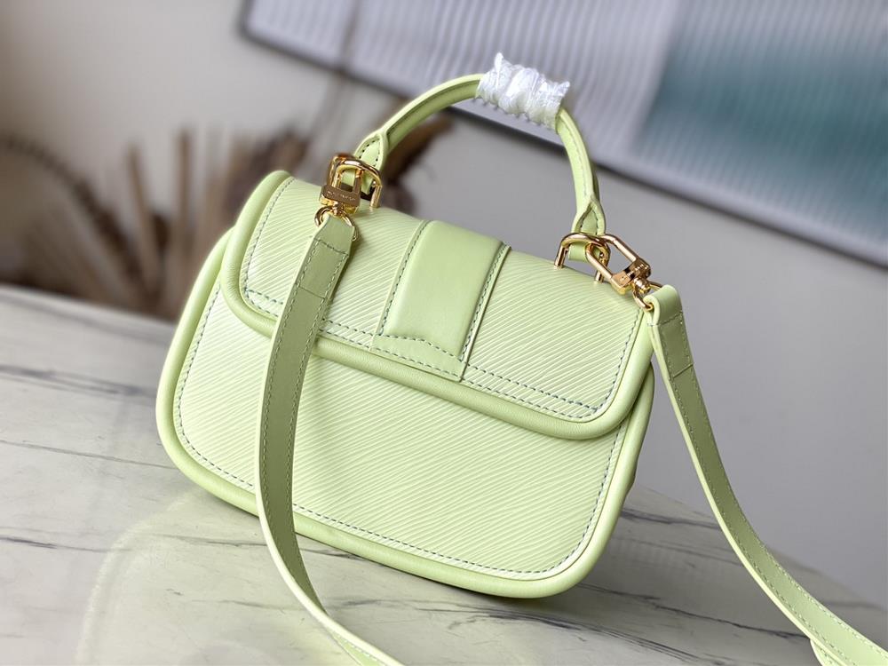 M22725 Apple GreenThis Hide Seek handbag features Epi leather accents in bright tones fea