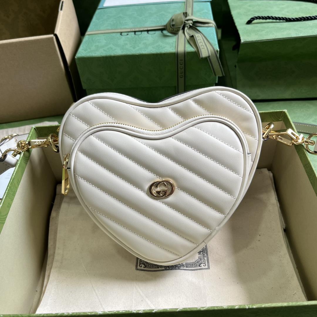 The interlocking G mini heartshaped shoulder bag draws inspiration from the past and present with t