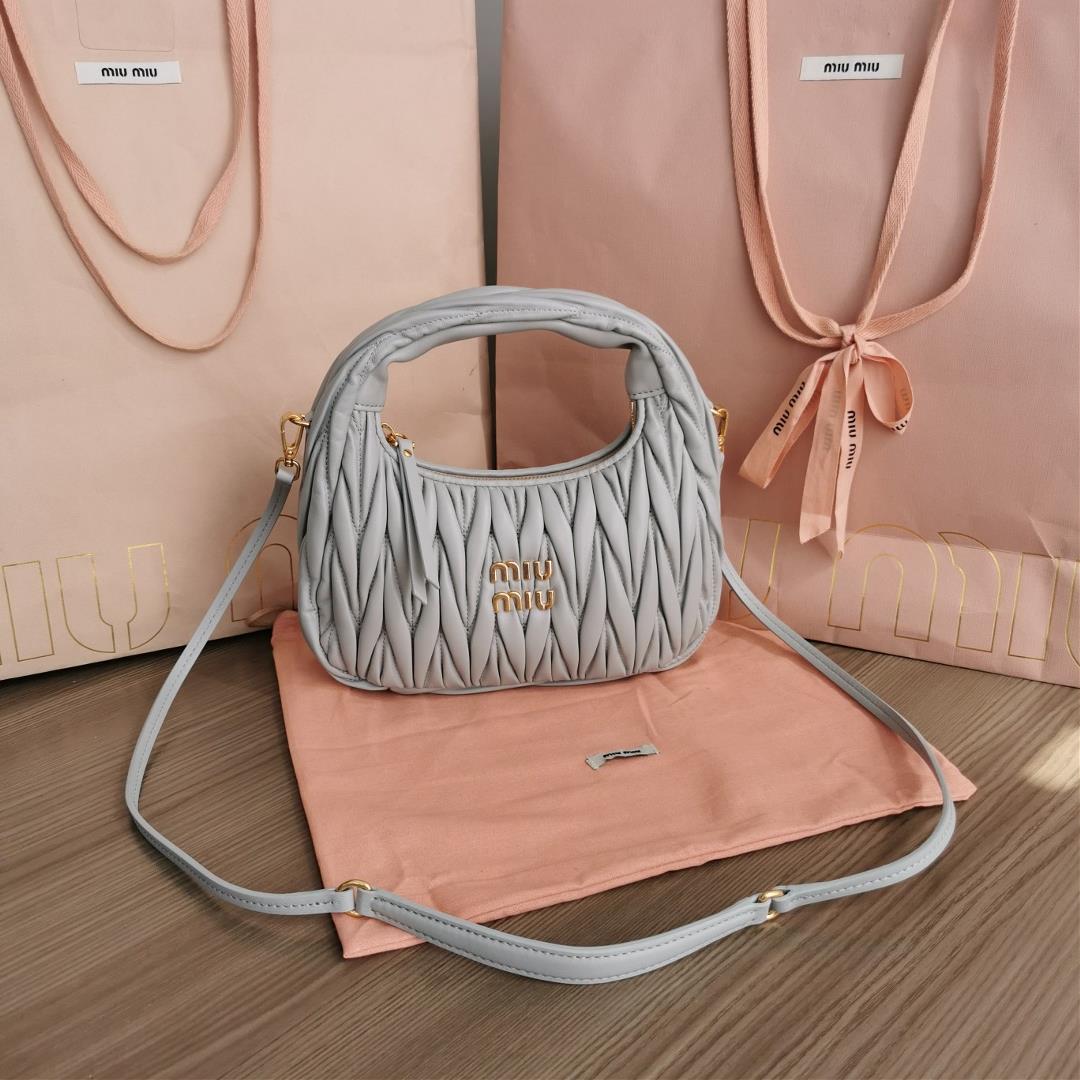 Medium The MiuWander handbag a new product from M family features the iconic Matelasse texture embro