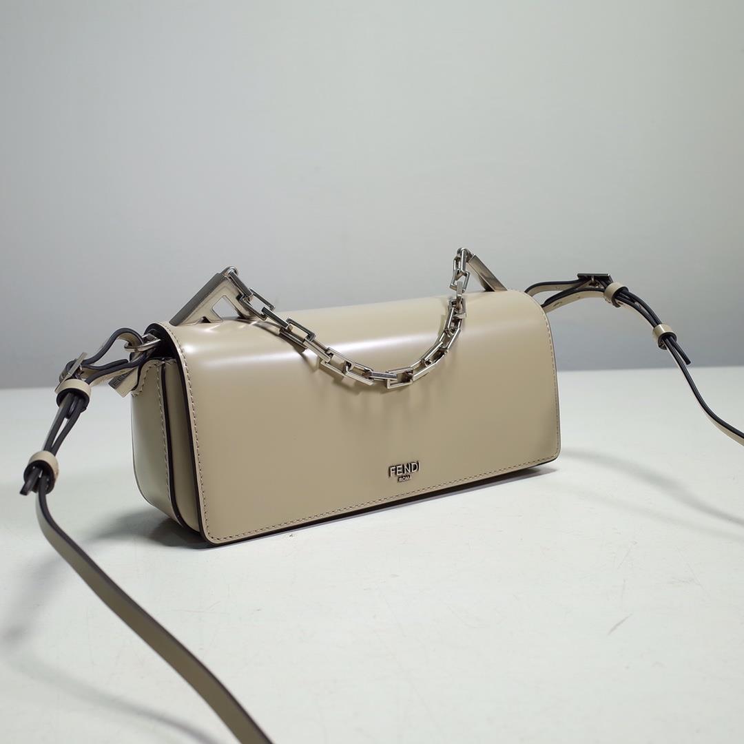 The FENDI handheld bag is made of beige brushed leather material decorated with large F metal 