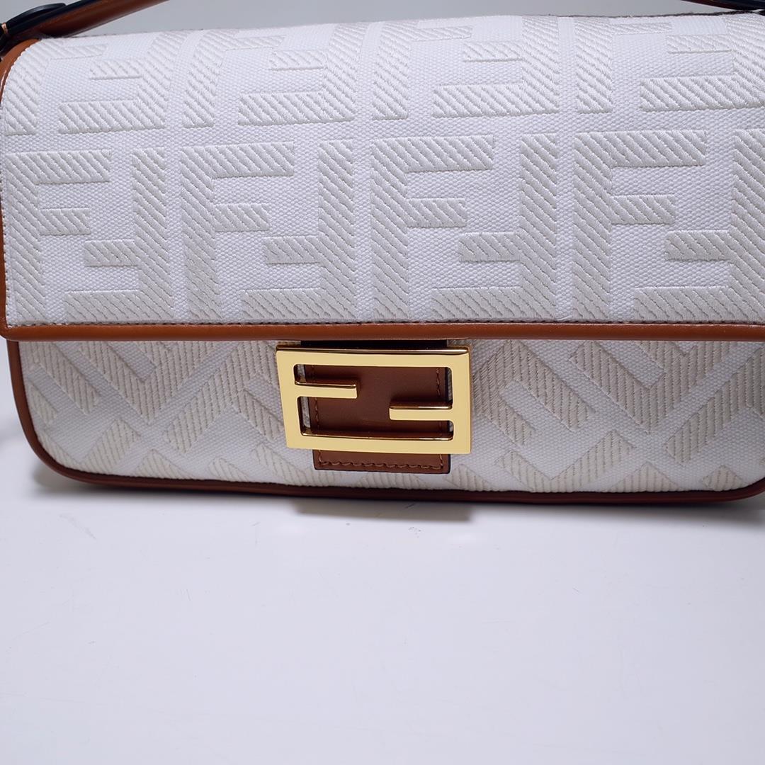 The FEND1 iconic Baguette handbag is made of white canvas material adorned with FF pattern emb