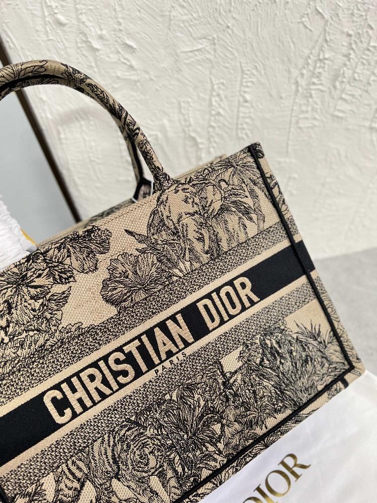 The Dior Bag Tote Book Tote Handbag is a true reflection of individuality With its wide