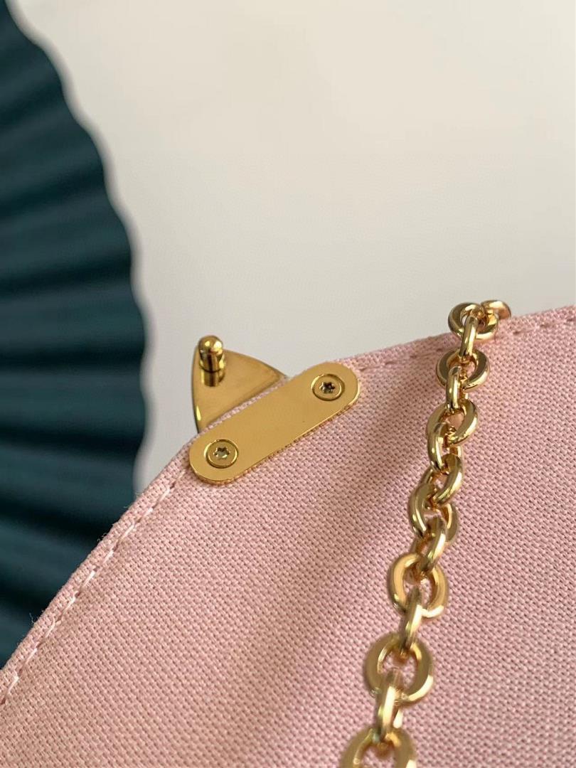 M81389 81390 This Micro Mtis chain bag is made of soft Monogram Imprente leather and features 