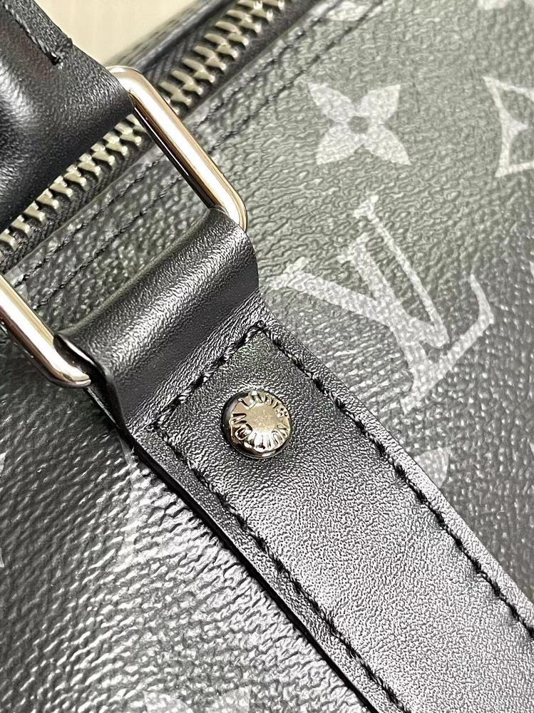 The LV Bag M46655 Keepall Bandoulire 35 in Monogram Eclipse is the perfect accessory for