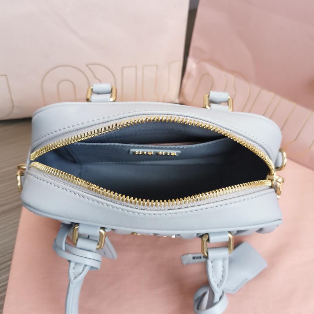 Medium The M familys new product Too Pretty Bowling Handbag features imported lamb skin classi