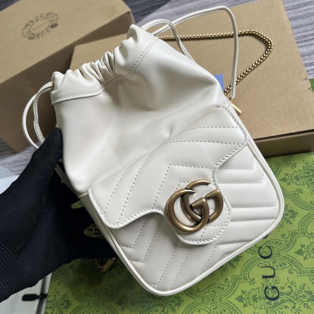 mini bucket bag is crafted with white quilted Vshaped leather As a iconic element of the GG Ma