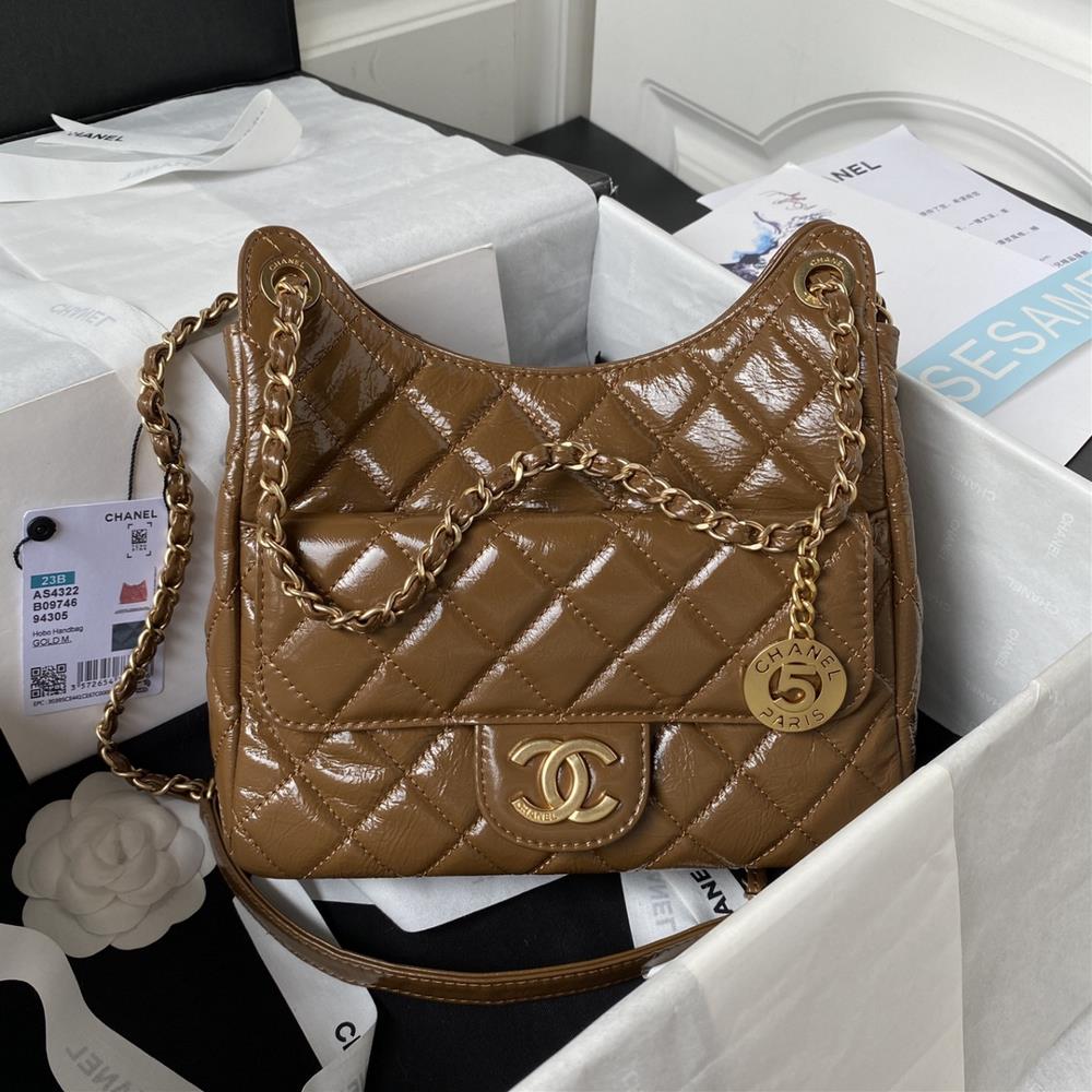 The mid size Chanel 23B AS4322 oil wax leather hobo stable shoulder bag has the highest attention to