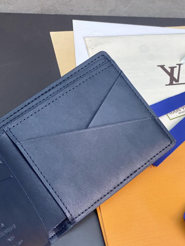 M82323 Blue This Multiples Wallet Uses Smooth Cowhide And Reproduces The Monography Pat