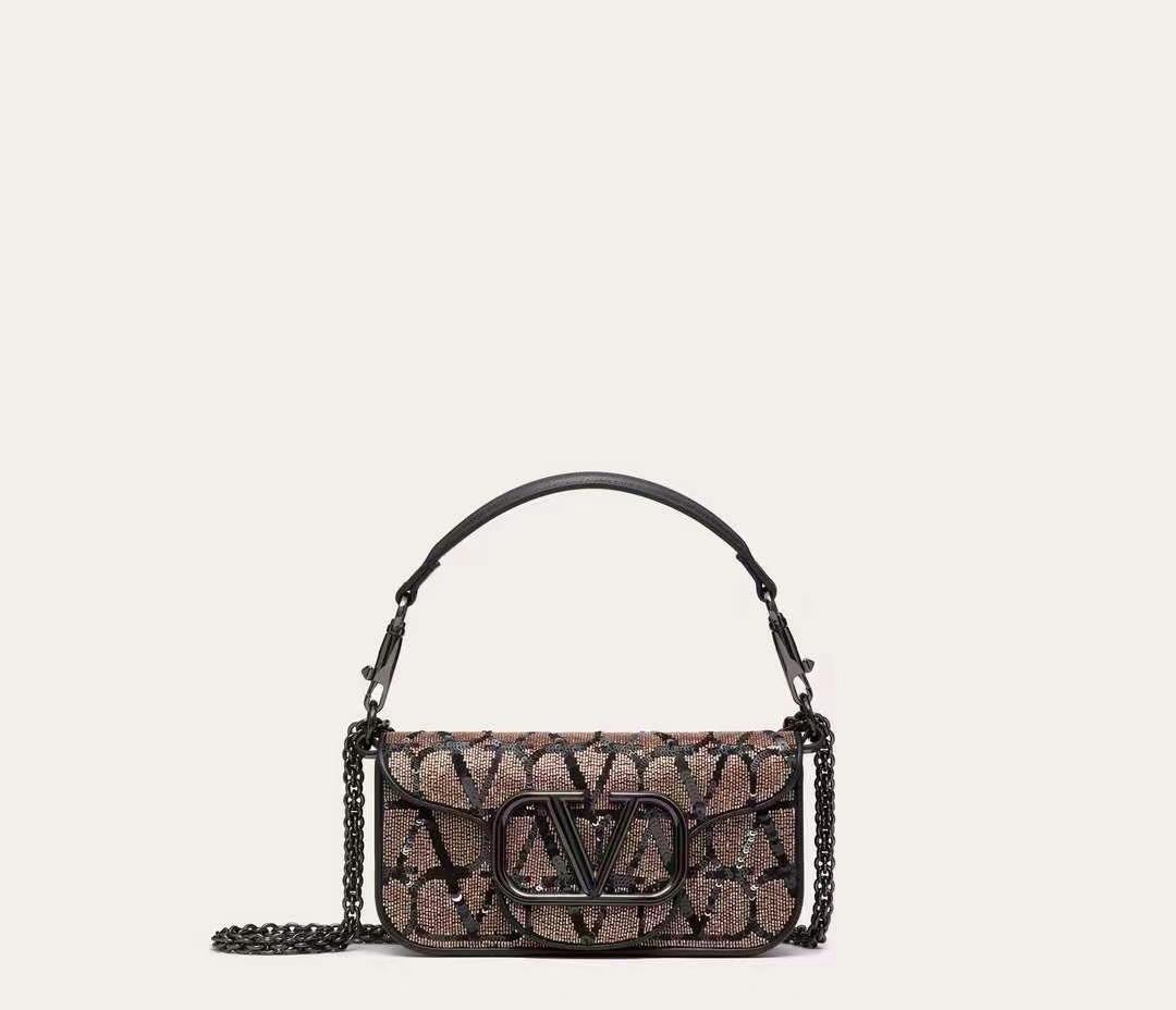 Valentino Garavani Mini Loc calfskin handbag with matching enamel VLogo Signature detailsEquipped wi