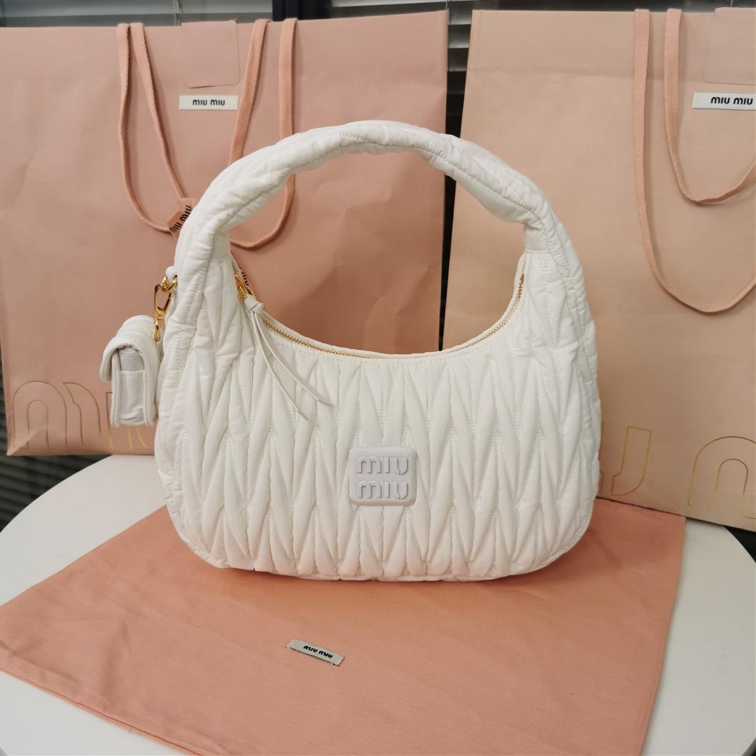 MiuWander handbag a new product of M family is made of environmentfriendly nylon The yarn is made of