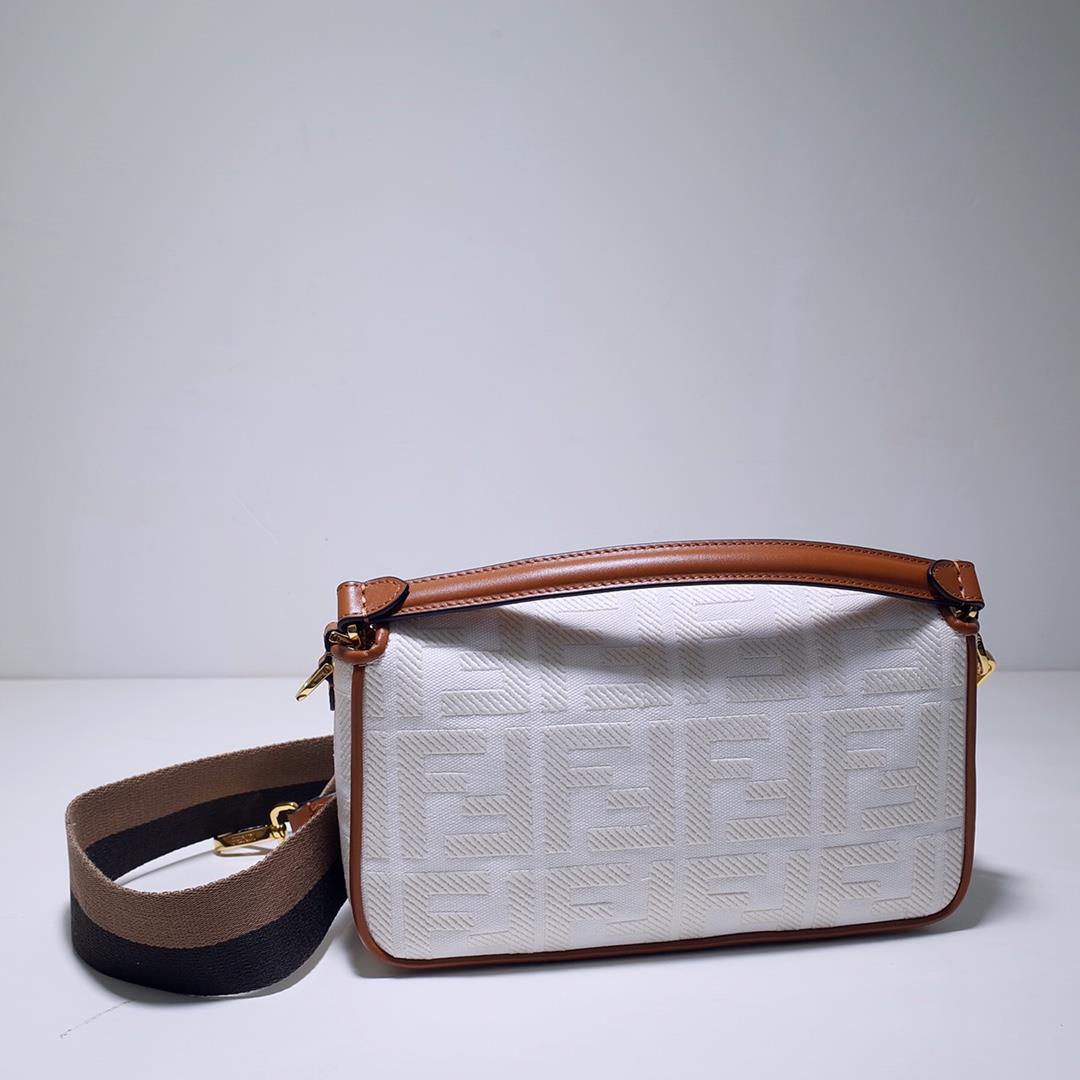 The FEND1 iconic Baguette handbag is made of white canvas material adorned with FF pattern emb