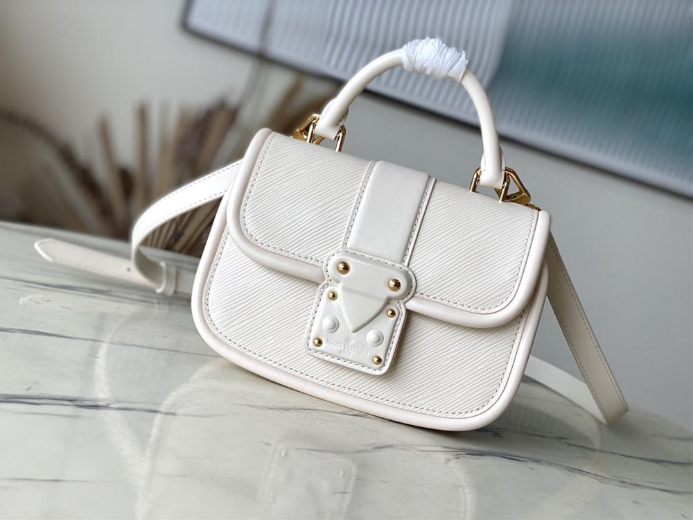 M22720 off whiteThis Hide Seek handbag features Epi leather accents in bright tones featuring a Toron roller handle and leather wrapped lock buckle