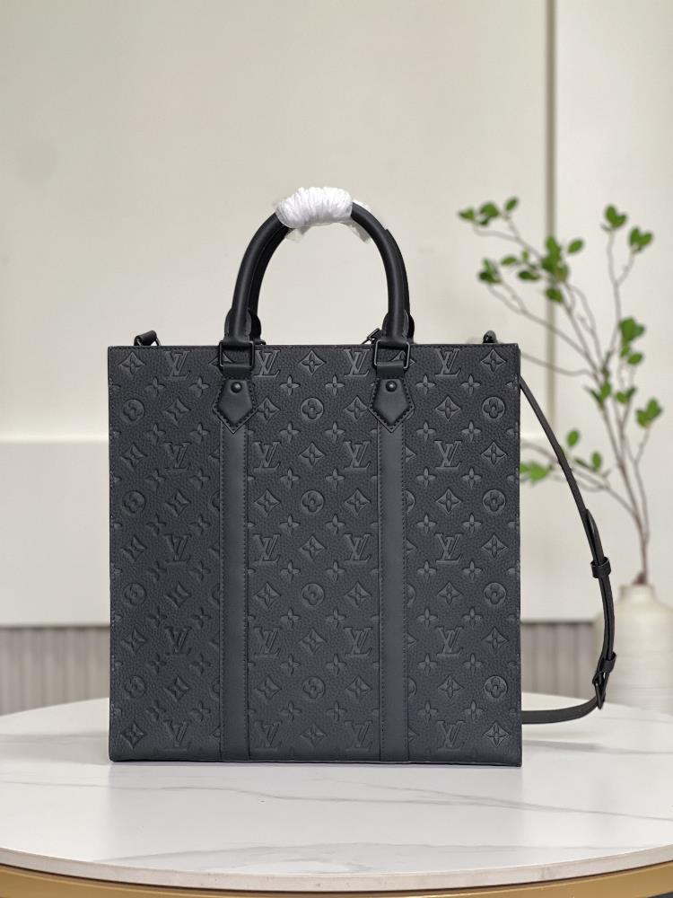 M21866 This Sac Plat hand bag material is made of Monogram patterned Taurillon leather Th