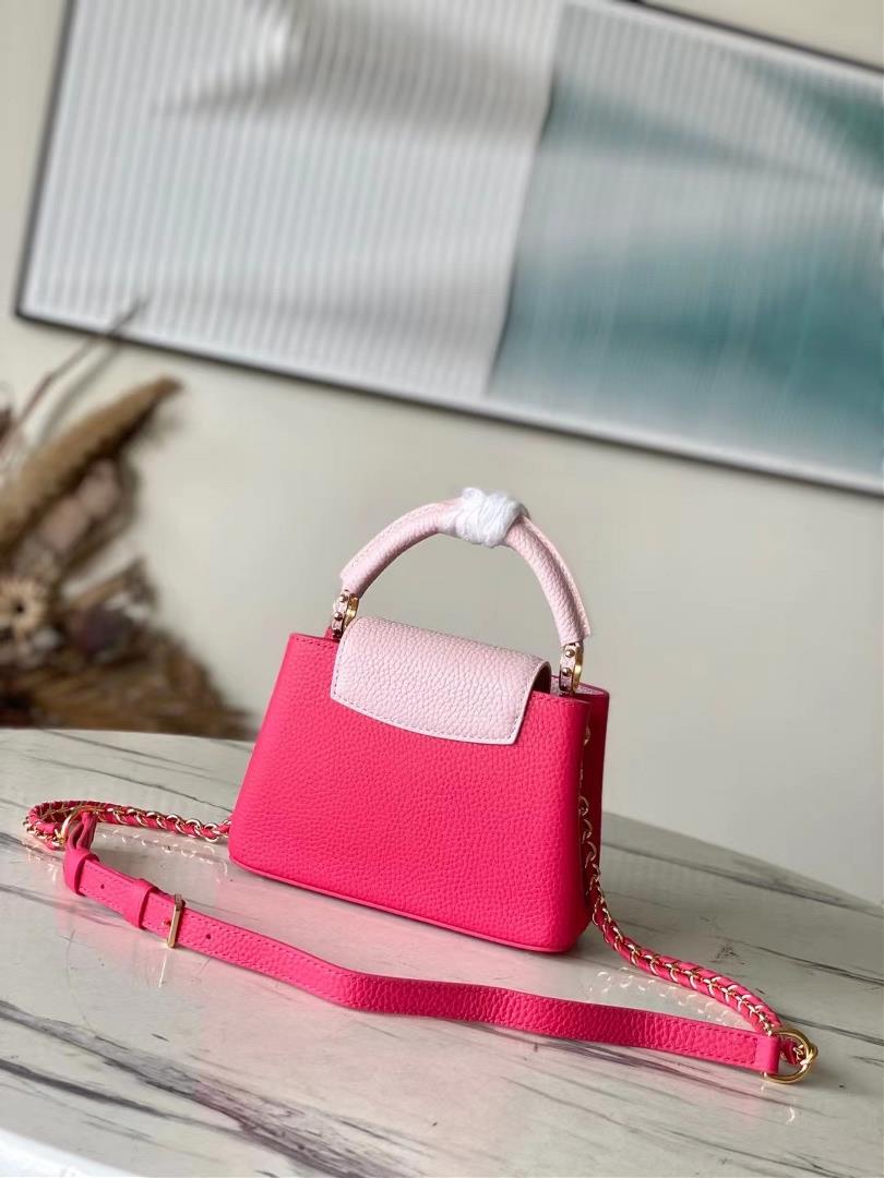 The topnotch original M21689 pink mini this Taurilon leather version of the Capuchines mini ha