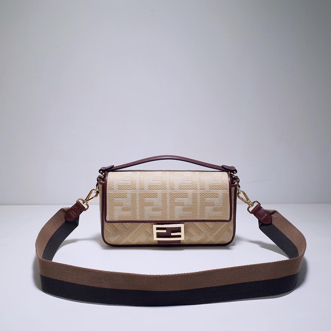 The FEND1 iconic Baguette handbag is made of beige canvas material adorned with FF pattern embroider