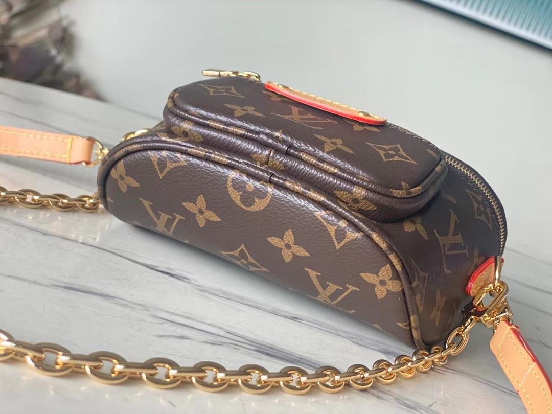 The toplevel original M82335 Mini Bumbag handbag is made of Monogram canvas showcasing a gentl