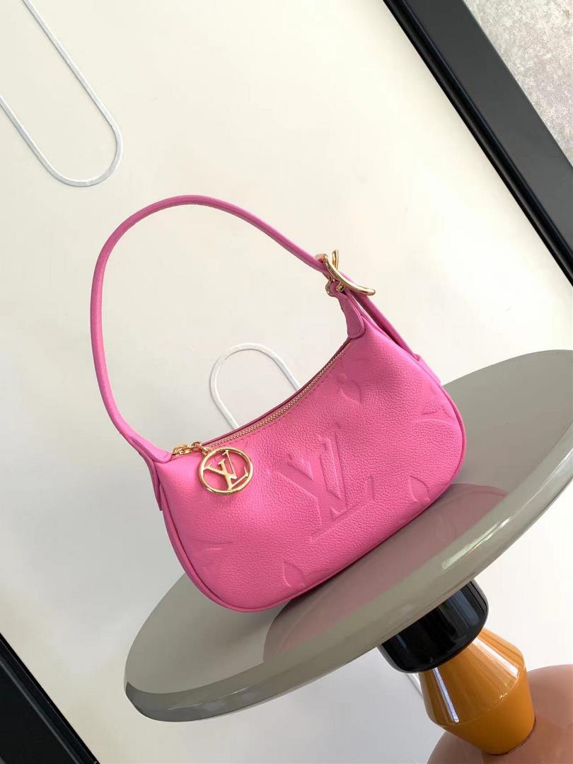 The M82391 M82519 Mini Moon handbag is made of soft Monogram Imprente embossed leather allowing eye