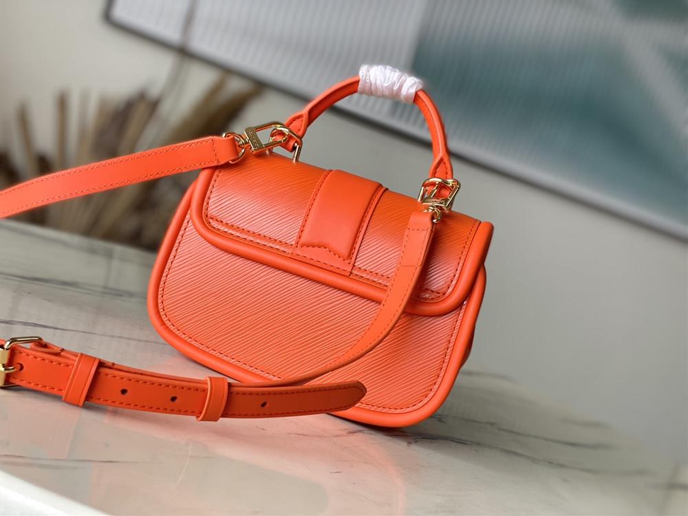 M22723 Orange This Hide Seek handbag features Epi leather accents in bright tones featuri