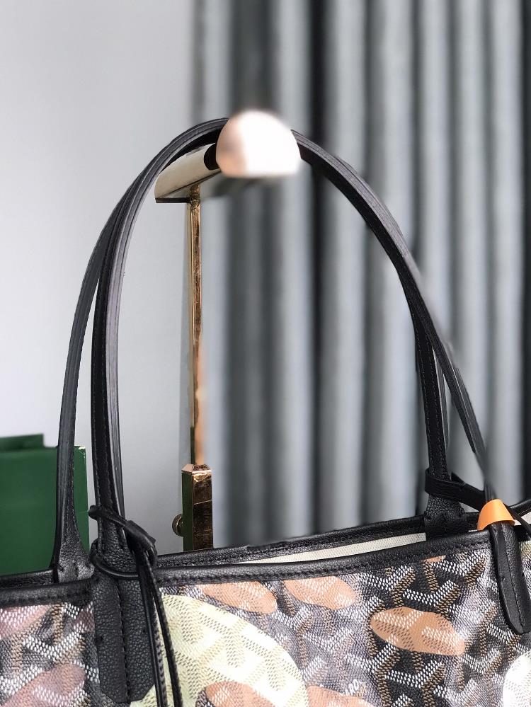 To further elevate its fashionable appeal the Goyard bag also features a camouflage print