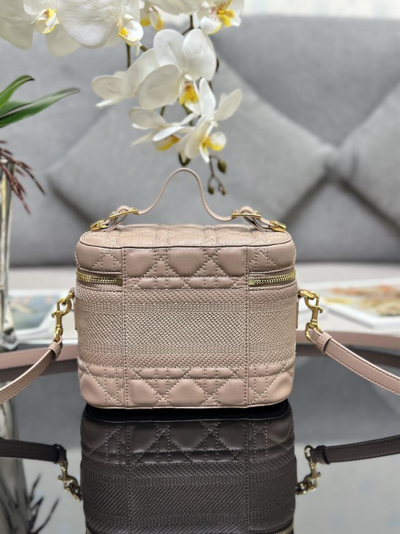 The ribbed Dior Travel handbag in the makeup bag showcases this seasons style Carefully crafte