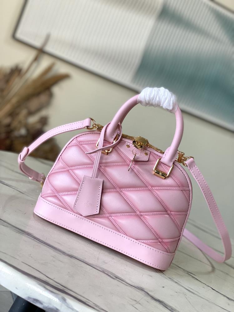 M23666 Pink M24453 PinkNicolas Ghesquires iconic Alma BB handbag is accented with sheep leather lining creating subtle shadow effects and baking eff