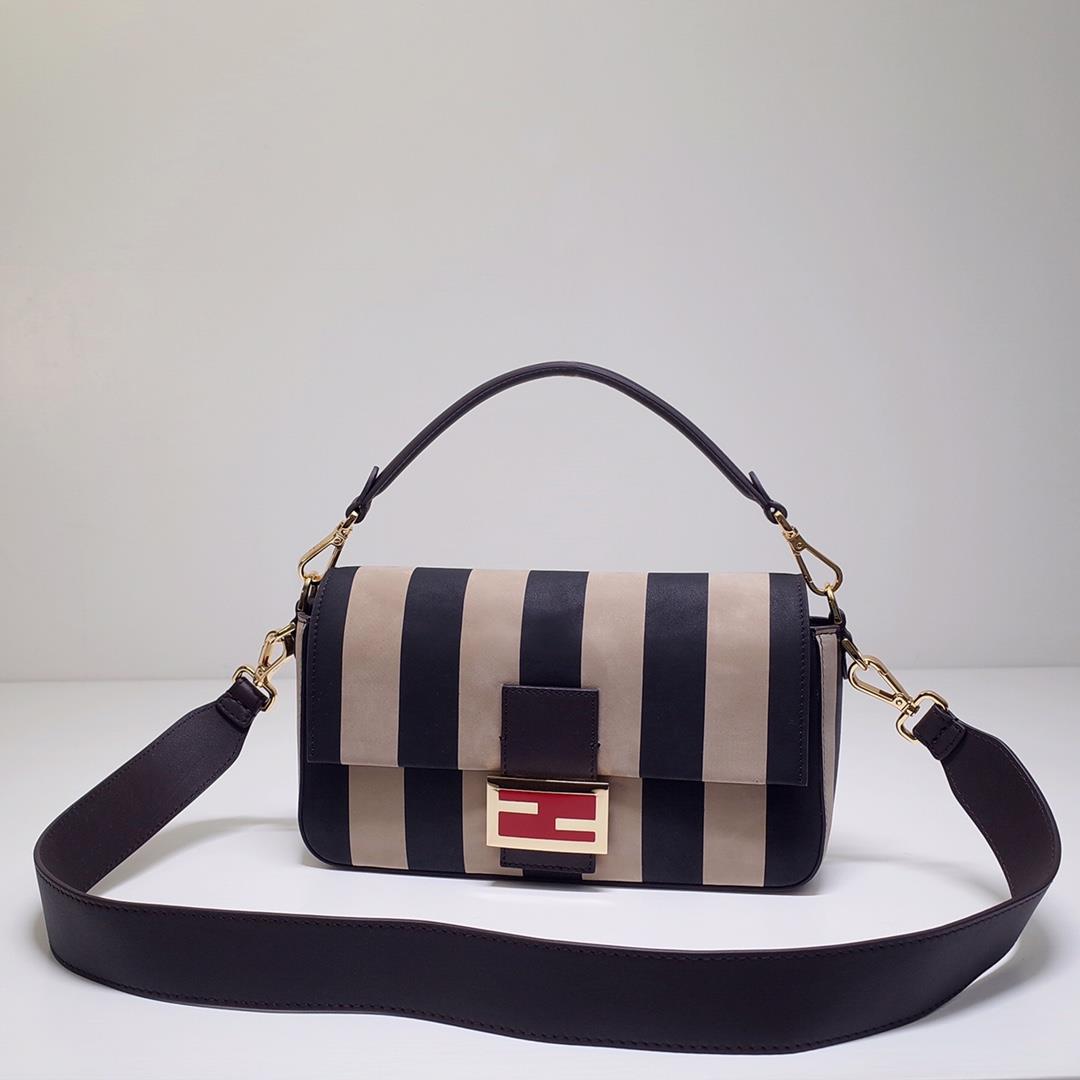 The FEND1 iconic Baguette Medium handbag features a flip design and FF magnetic buckle The lining is