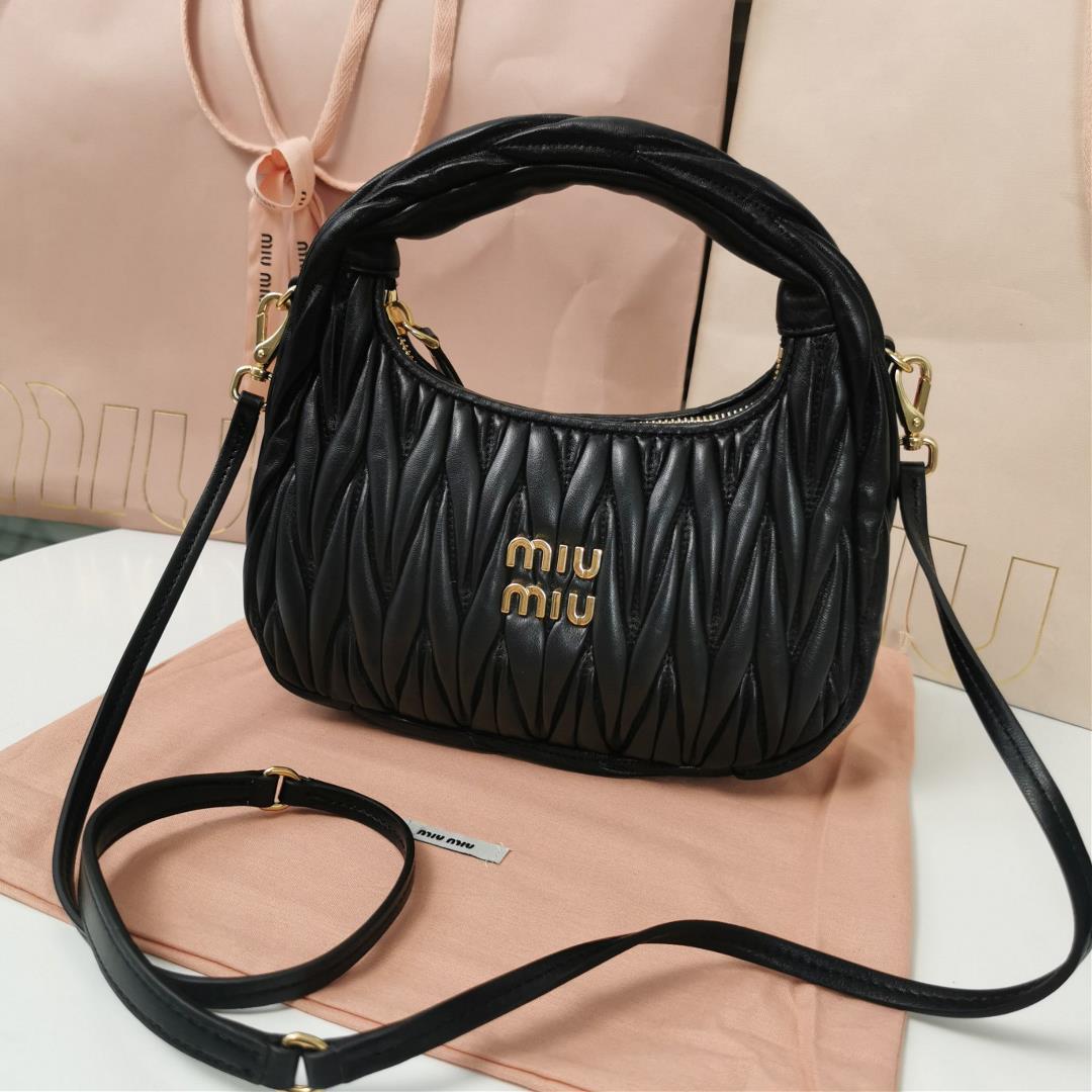 Medium The MiuWander handbag a new product from M family features the iconic Matelasse texture embro