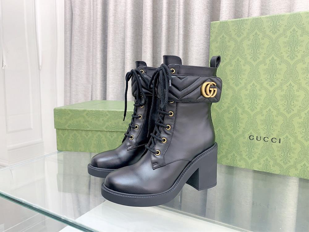 This womens high heel ankle boot is meticulously decorated with classic double G shaped accessories This accessory is inspired by the Gucci collect